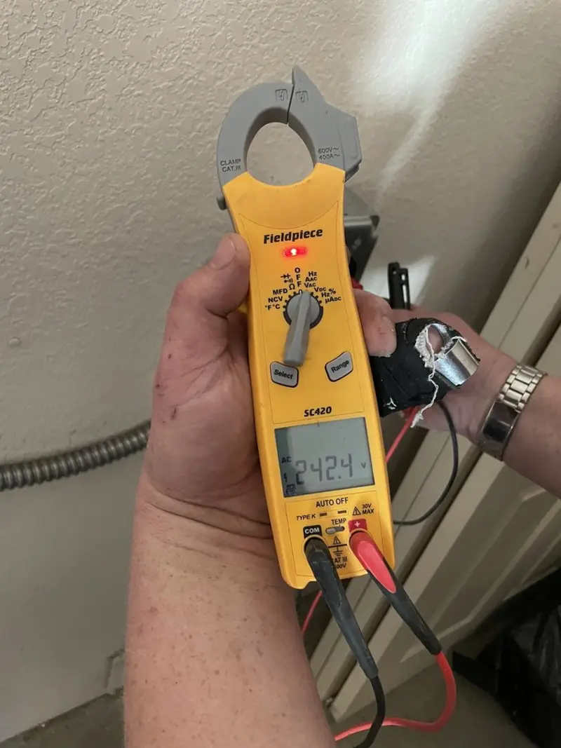 Voltage testing with clamp meter during Aluminum Wiring Replacement in Point Pleasant Beach